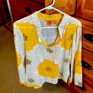 Add some sparkle to your life. Tory Burch Size 10 lightweight blouse.